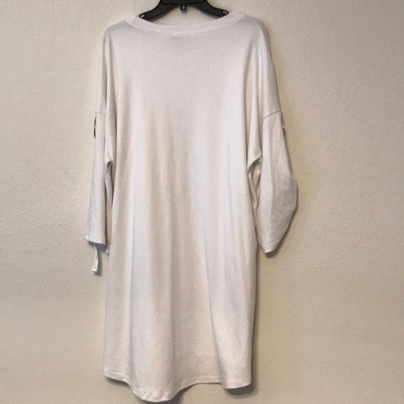 Dress with ribbons and rings - Picture 2 of 4